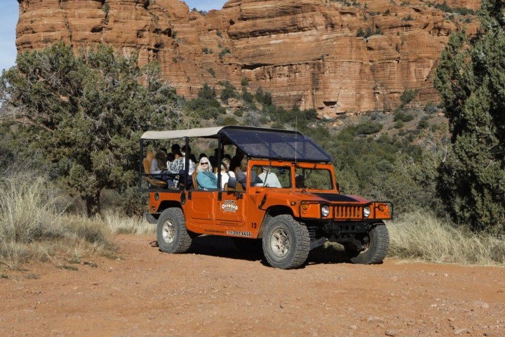 orange hummer full of people on a tour in sedona az